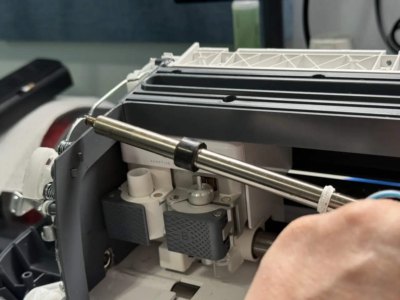 The bar being lifted over the left side